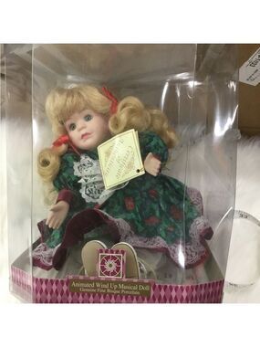 Soft Expressions Animated wind up musical doll